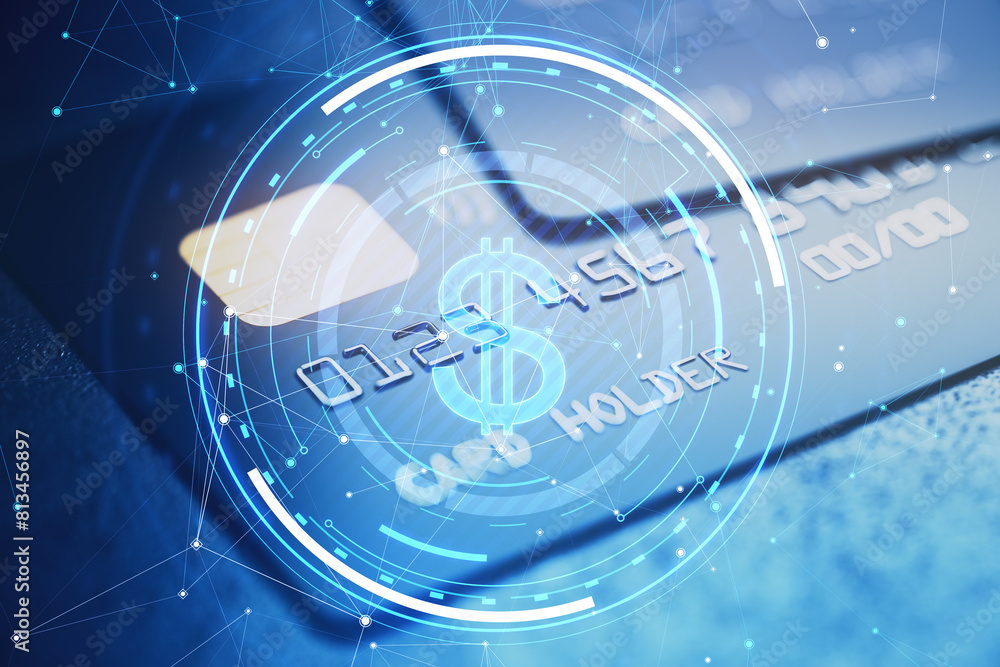 Poster Close up of bank cards with glowing round dollar hologram with polygonal mesh and bokeh circles on blurry blue background. Digital banking, money and finance concept. Double exposure.