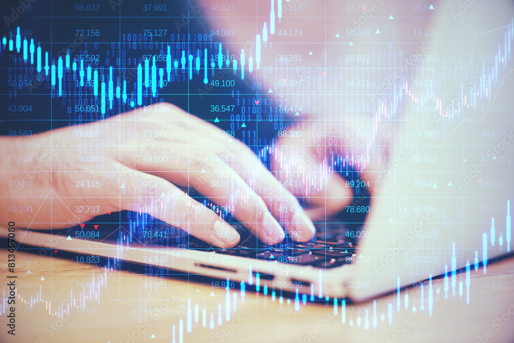 Poster close up of male hands using laptop keyboard with creative candlestick forex chart with index on blu