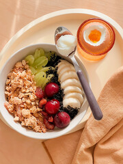 Healthy granola yogurt with mixed fruits for breakfast. Break time. Delicious food. Healthy recipes. Homemade food. Cooking recipes. Honey granola. Cozy space. Fresh fruits granola. Happy holidays.