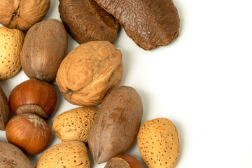 Close view of tree nuts mixture on white background with copy space