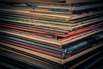 Vintage vinyl records on a grunge background. Toned.