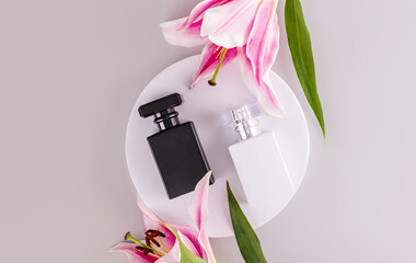 Two luxurious matte perfume bottles or sprays on a white round podium. lily. black and white...