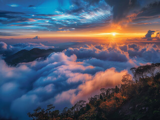 Fototapeta premium view of carpet cloud from peak of mountain during sunrise - ai