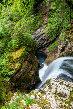 Thur River waterfall from rock formation in forest