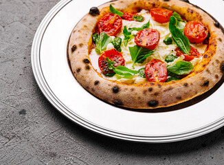 Fresh italian margherita pizza on plate