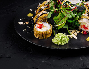 Gourmet sushi roll platter on dark background