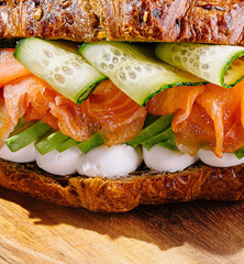 Gourmet smoked salmon sandwich on rustic bread