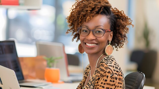 African women feel happy working with laptops
