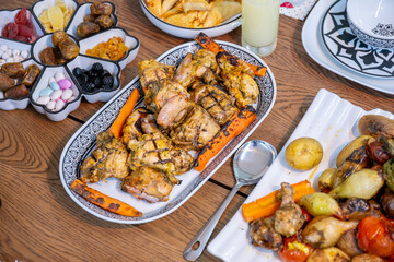 Grilled chicken with vegetables  on dinner table