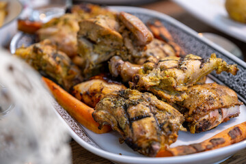 Grilled chicken with vegetables  on dinner table