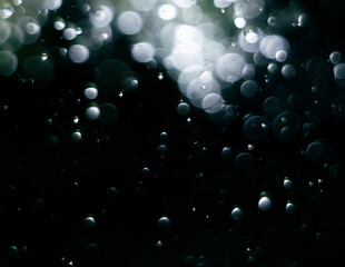 Abstract background - bubbles in dark water.