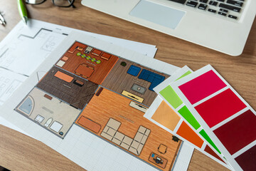 Drawings, architectural drawings of the modern house with color swatches on table