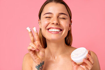 Cosmetology, beauty and spa treatment. Woman in lingerie on pink background.