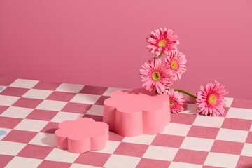 Template for design with blank flower shaped platform placed on checkered table cloth over pink background. Empty space adding text or element of design