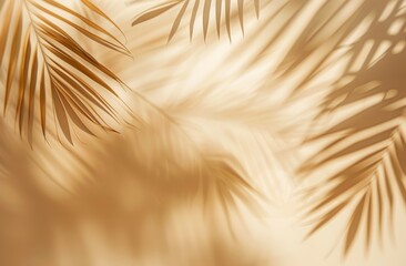 Obraz premium A light peach background with the shadow of palm leaves, creating an elegant and natural atmosphere forproduct presentation, as a mockup template. Abstract background with palm leaf shadows on a beige