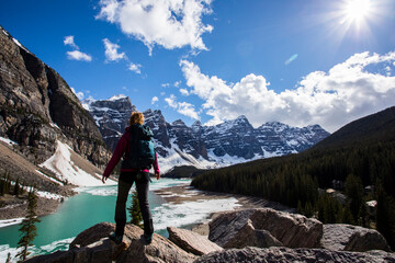 Young woman in Moraine lake, Banff National Park, Canada