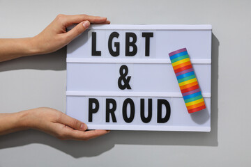 LGBT parade concept, inscription on white board.
