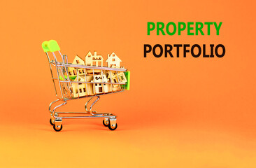 Property portfolio symbol. Concept words Property portfolio on beautiful orange paper. Shop cart,...