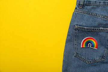 Fototapeta premium LGBT parade concept, free love symbol on yellow background.