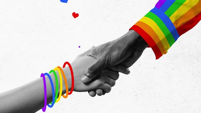 Stop motion. Animation. Two hands holding each other wearing friendship bracelet, clothes with rainbow colors. Unity and solidarity. Concept of freedom, love diversity celebration. Ad