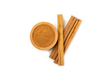 Cinnamon powder  isolated on white background. Spicy spice for baking, desserts and drinks. Fragrant ground cinnamon.