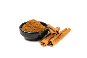 Cinnamon powder  isolated on white background. Spicy spice for baking, desserts and drinks. Fragrant ground cinnamon.