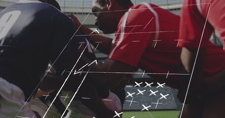 Image of game strategy over diverse male rugby players at stadium