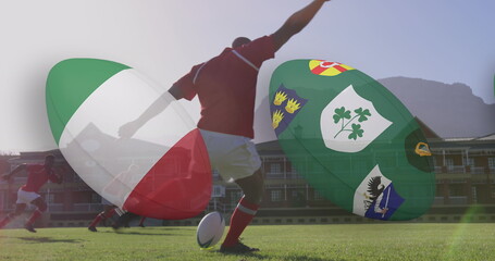 Image of diverse male rugby players with rugby balls with national flags over stadium