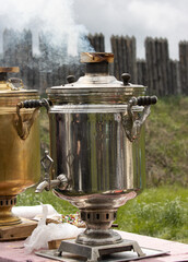samovar with tea in nature.