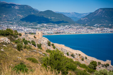 Aerial view of Alanya medieval castle with Alanya city on background, Turkey.