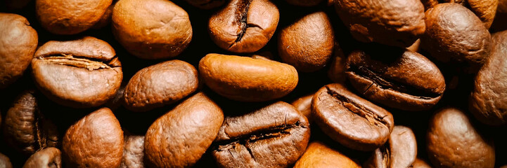 Close-up of roasted coffee beans, perfect for International Coffee Day themes and food and beverage...