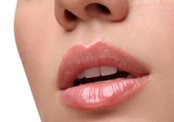 Woman wearing beautiful lip gloss on white background, closeup