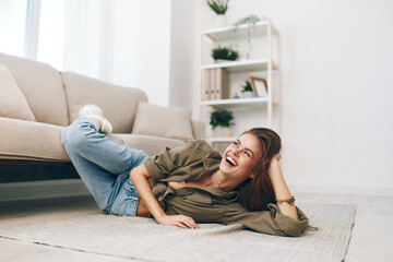 Comfortable Living: Woman Relaxing on Cozy Sofa in Modern Apartment