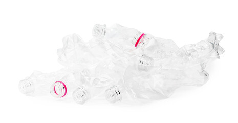 Crumpled disposable plastic bottles on white background