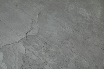 Grey concrete textured surface as background, closeup