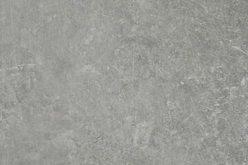 Grey concrete textured surface as background, closeup