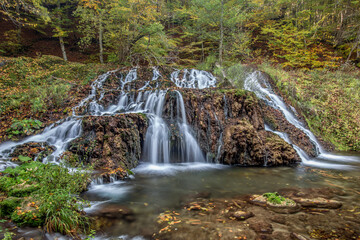 Fototapeta premium Beautiful shot of cascade waterfalls in a forest