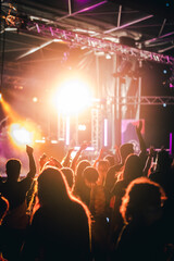 Music event with dancing crowd and disco lights