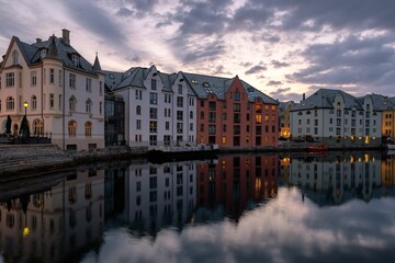 Beautiful view of old buildings with reflection on a river