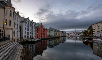 Beautiful view of old buildings with reflection on a river