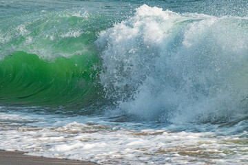wave breaking on the beach