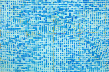pattern of small blue and white tiles in harmonic structure like a swimming pool ground