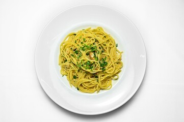 Gourmet plate of spaghetti with herbs isolated on a white background