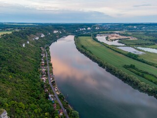 Aerial view of a river stream at sunset