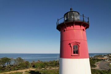 Closeup shot of a lighthouse near the ocean