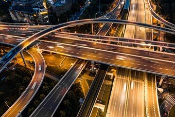 Aerial view of Wuhan Optics Valley Avenue overpass during evening peak hours.