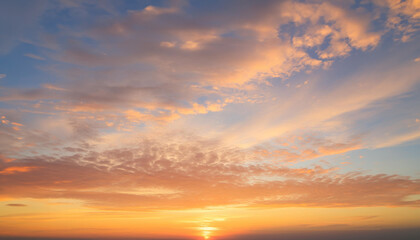 Fototapeta premium Real majestic sunrise sundown sky background with gentle colorful clouds.