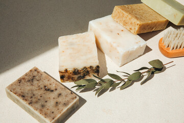 Handmade soap from natural ingredients, various herbs. Concept of sustainable use, bath products. Top view