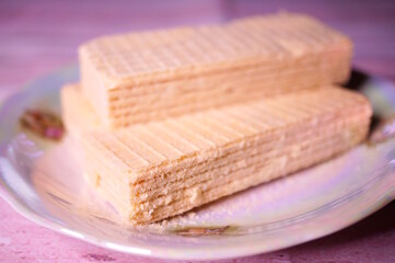 Sweet waffle on the table. A light snack.