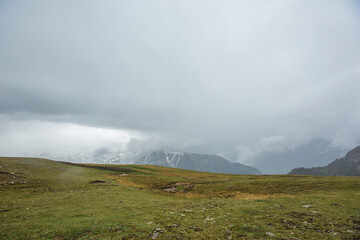 Caucasus Mountains foggy landscape. Karachay-Cherkessia republic, Russia